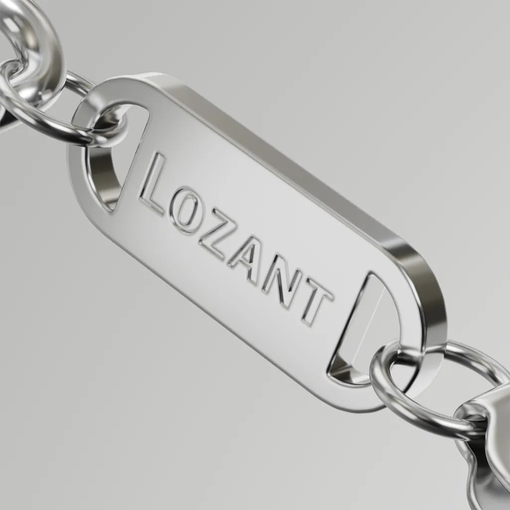 Silver chain with a 'LOZANT' tag on a light gray background